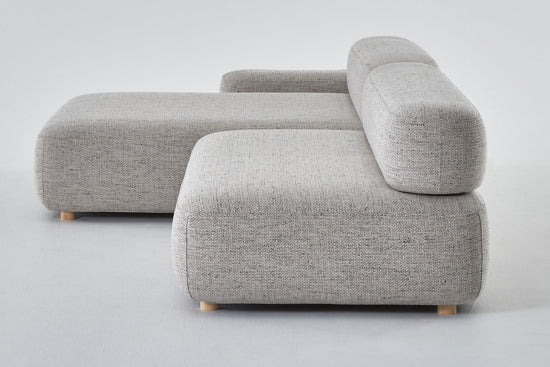 Flux chaise with arm and seat viewed from seat end.