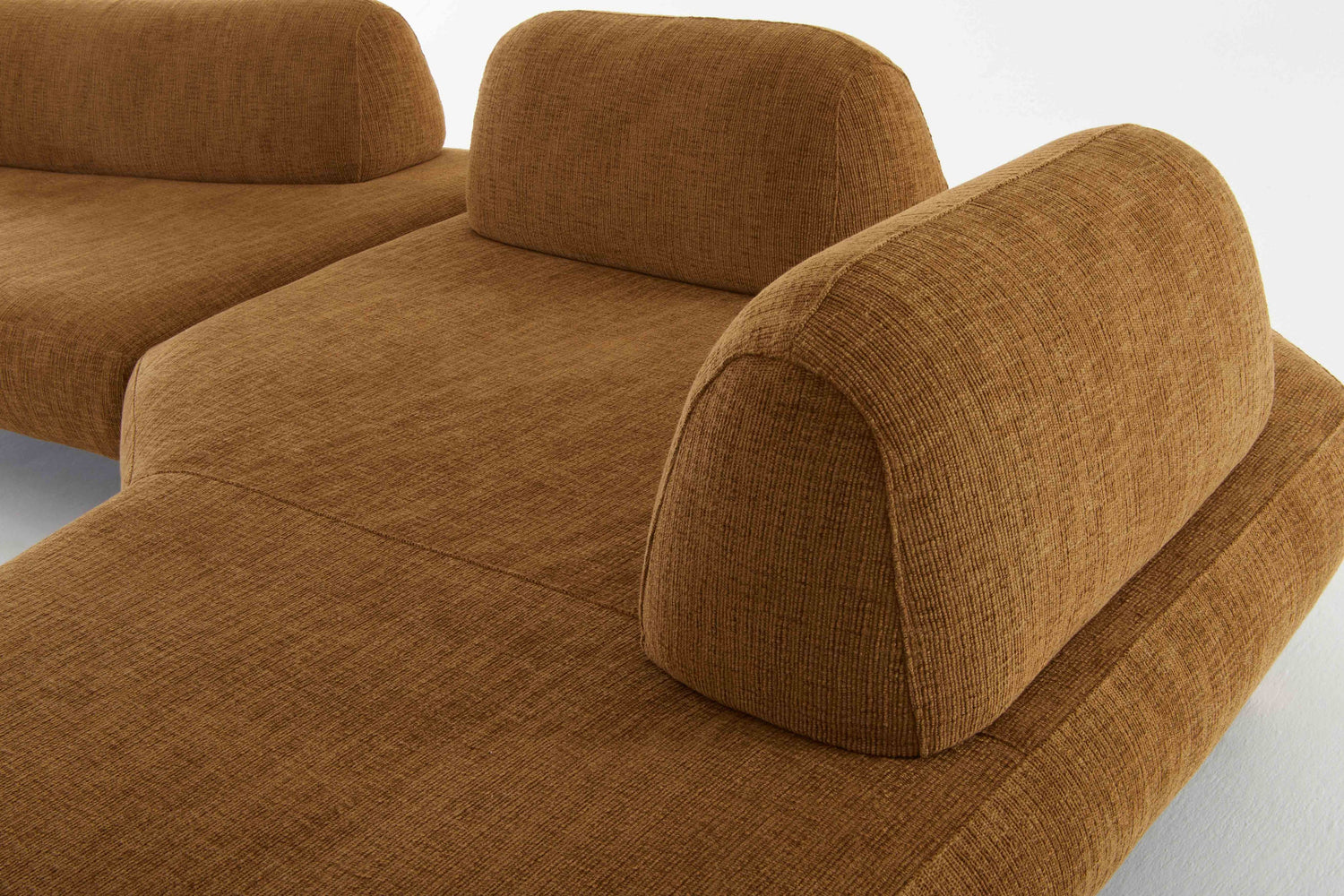 Locus modular sofa in burnt sienna view to corner.