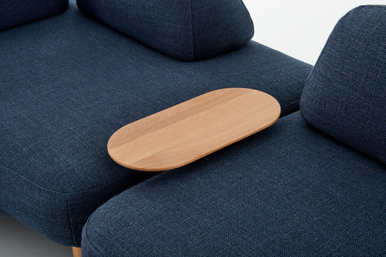 Ethos Max blue sofa showing Ethos solid oak side table in between modules.