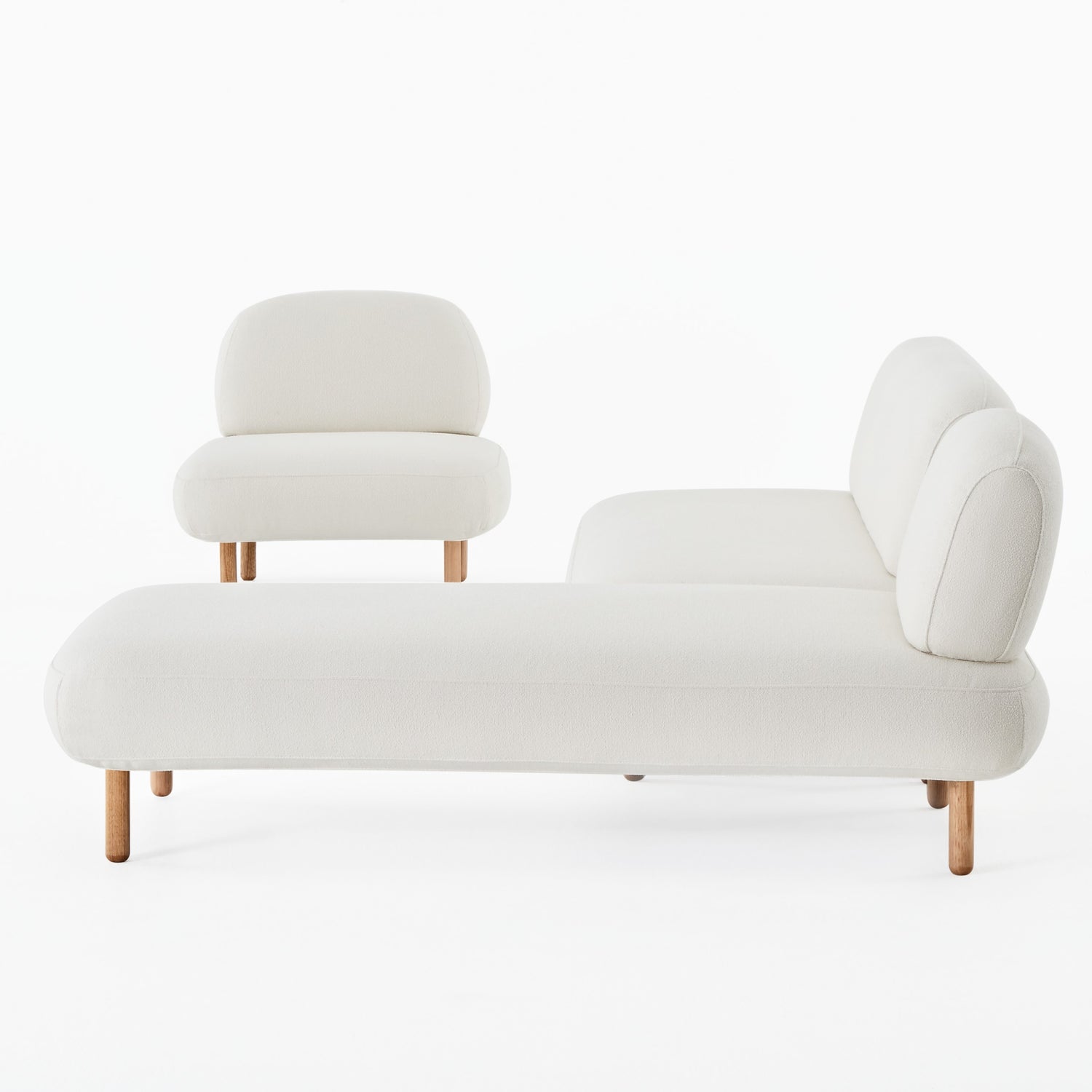 Ethos white 3 piece sofa setting with chair, 2 seater and chaise, seen from the side.