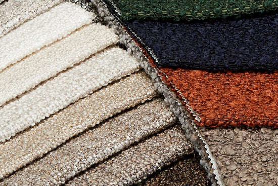 Fabric swatches in white, creams, browns, green, blue and orange.