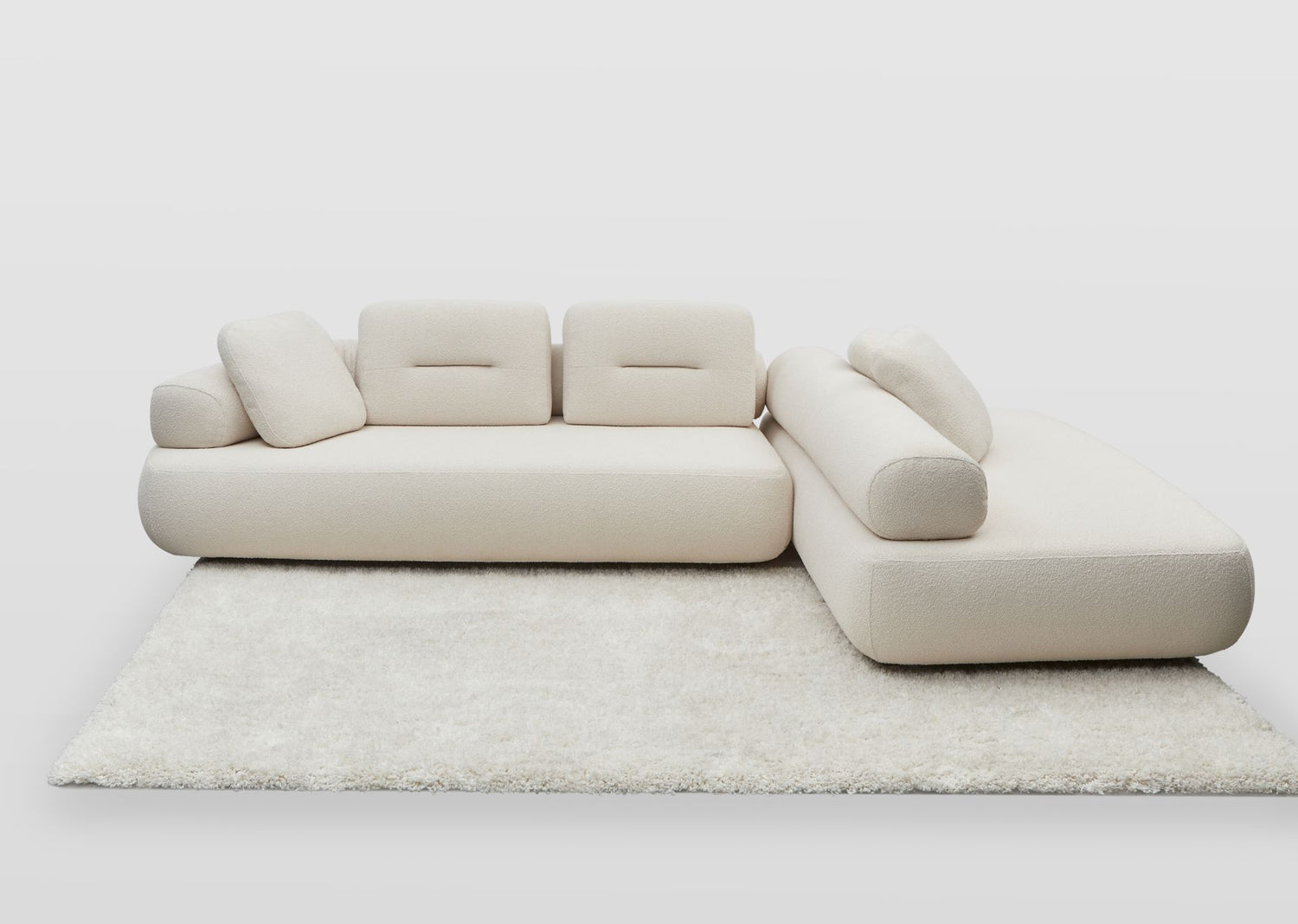Newman designer sofa and chaise with chaise roll re-orientated to face other direction