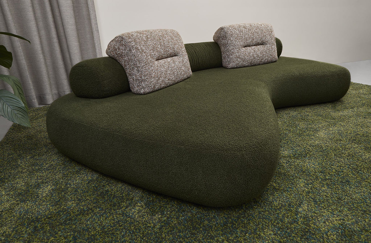 Rolly curved sofa 3 metre from left hand side in green with moveable back roll and back cushions