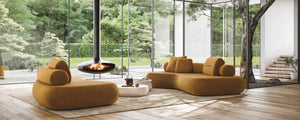 Two Rolly modern designer sofas - one 3 metre and one 2 metre in a glass windowed lounge room.